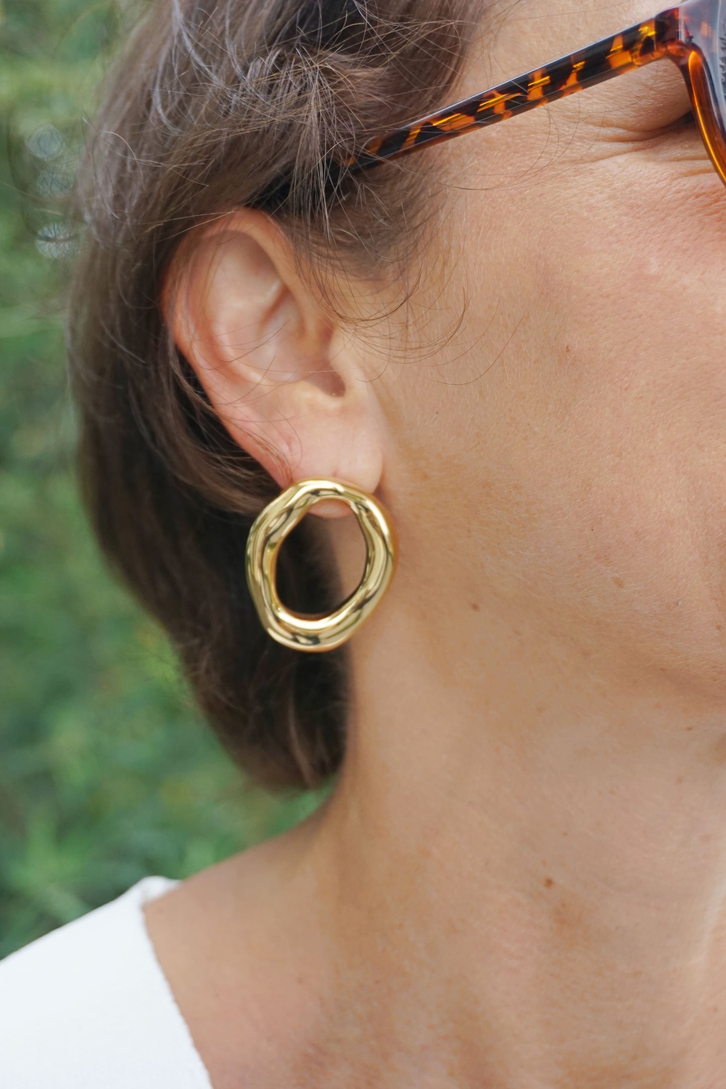 Boucles d’oreilles dorées rond organique