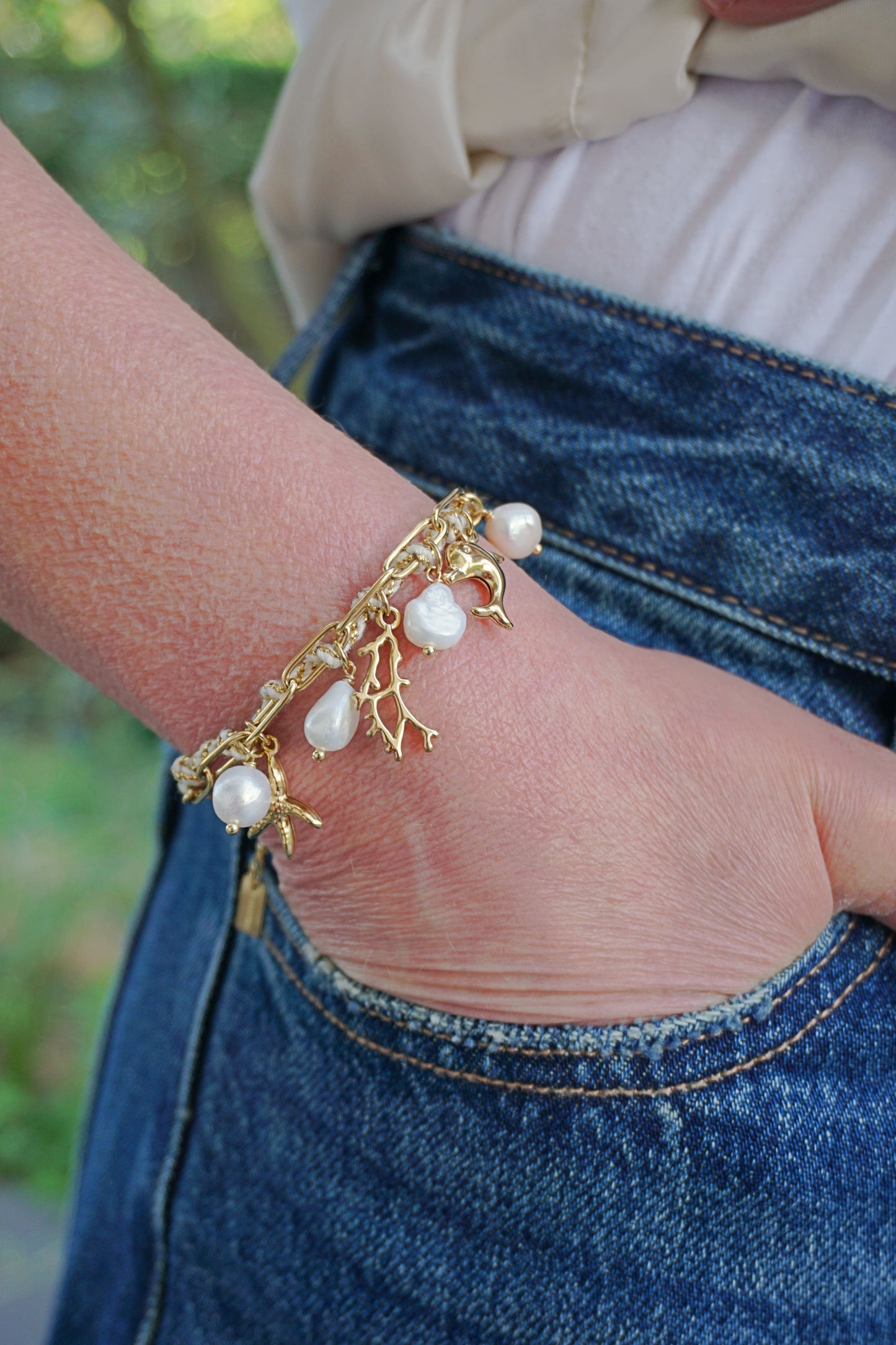 Bracelet doré corde charms corail