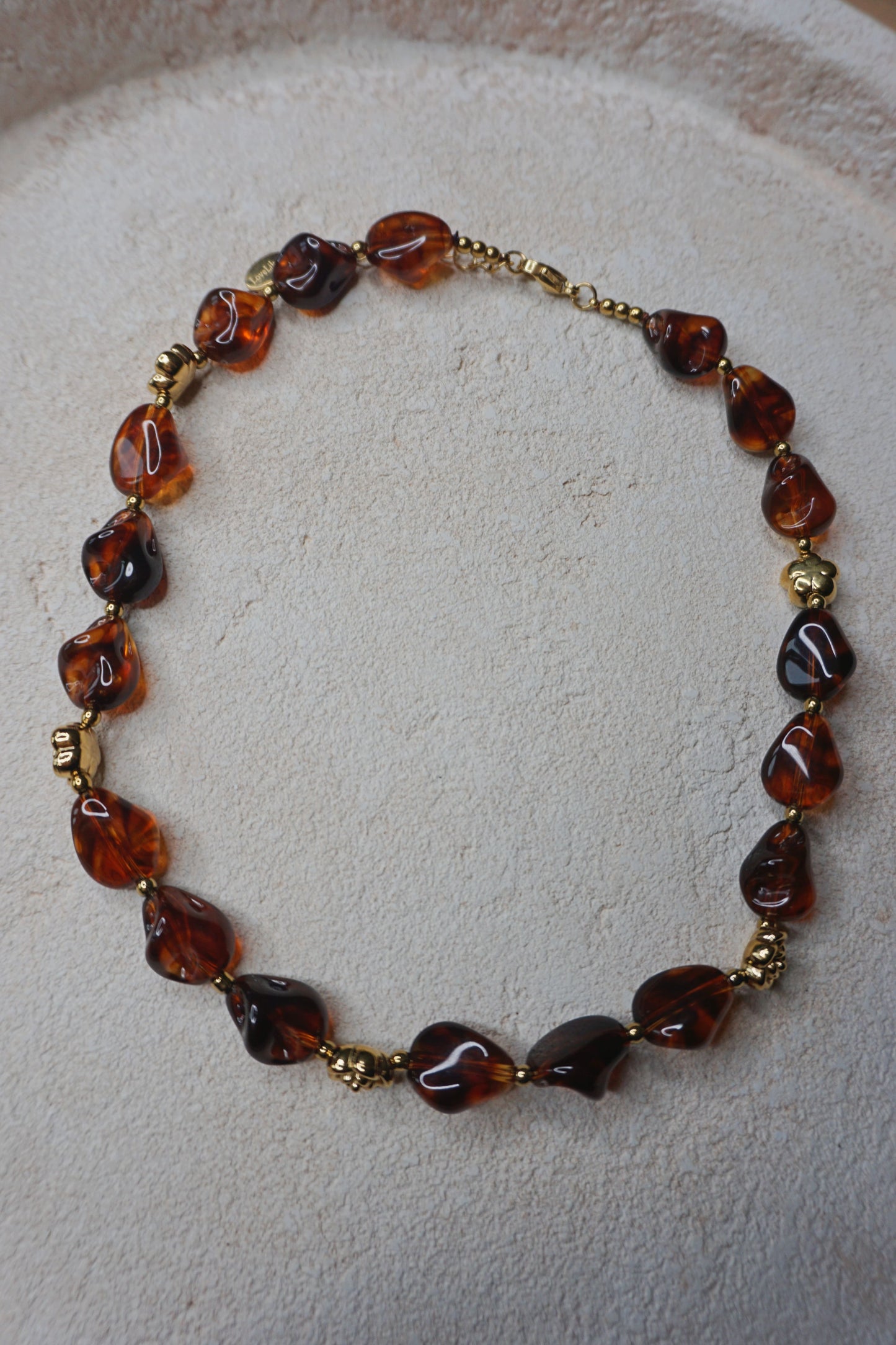 Collier ambré marron et doré