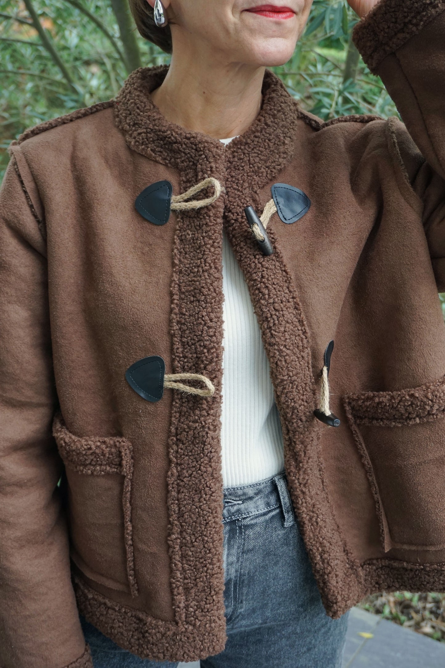 Manteau marron chocolat et attaches