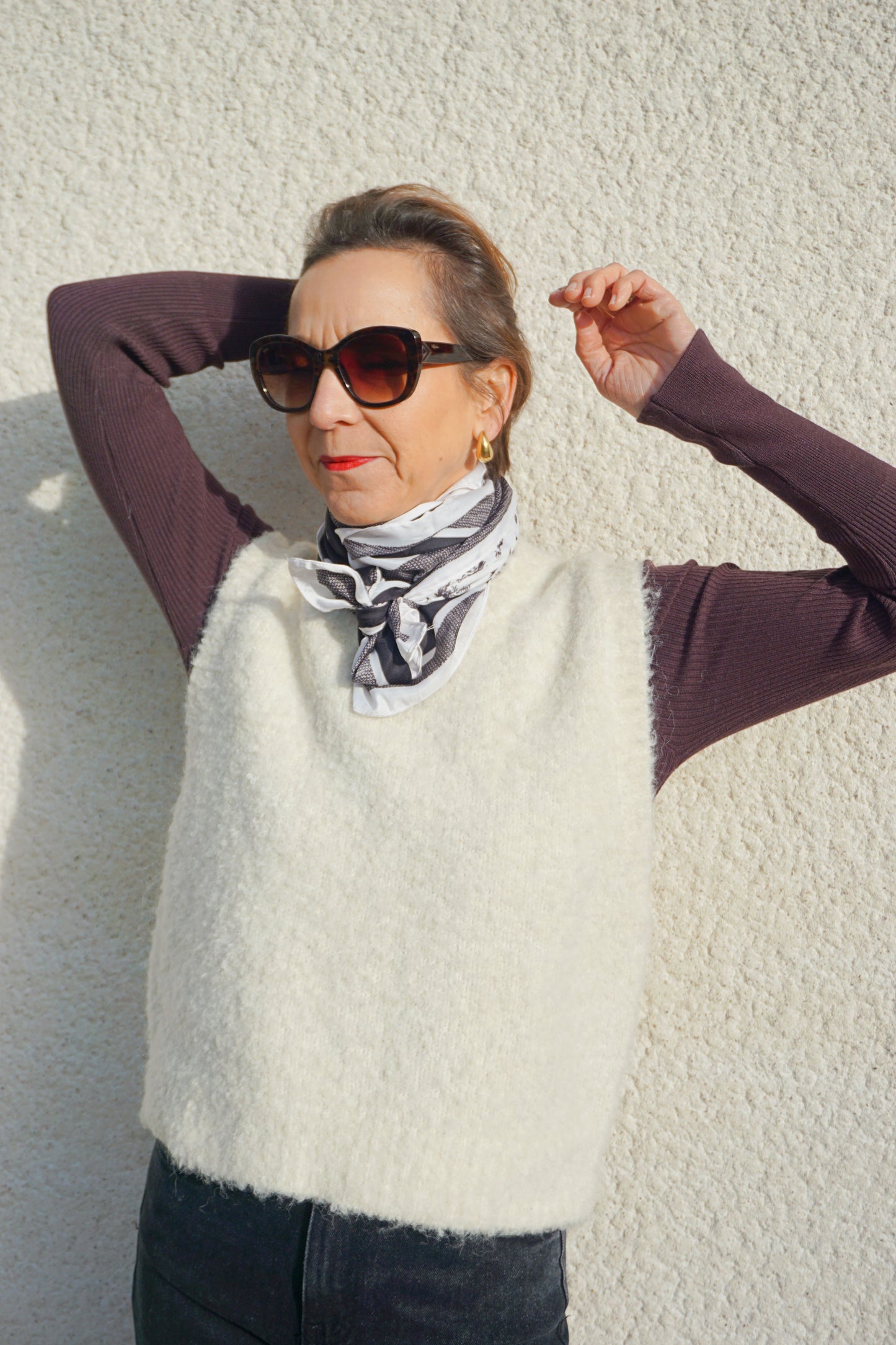 Pull sans manches crème bouclettes