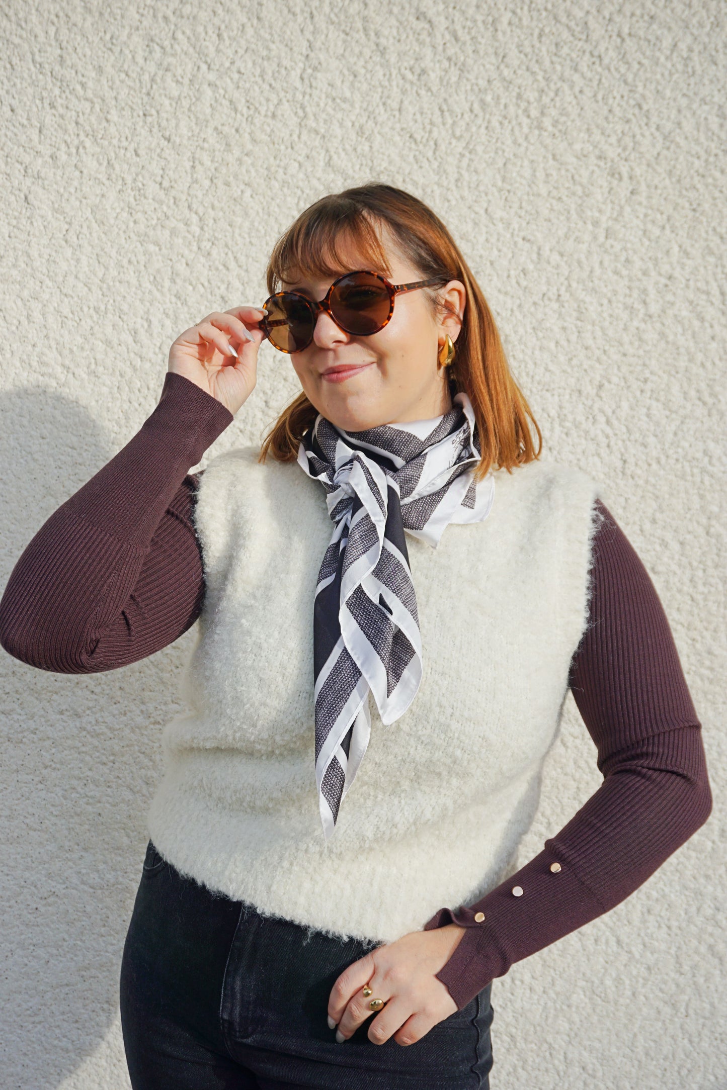 Pull sans manches crème bouclettes