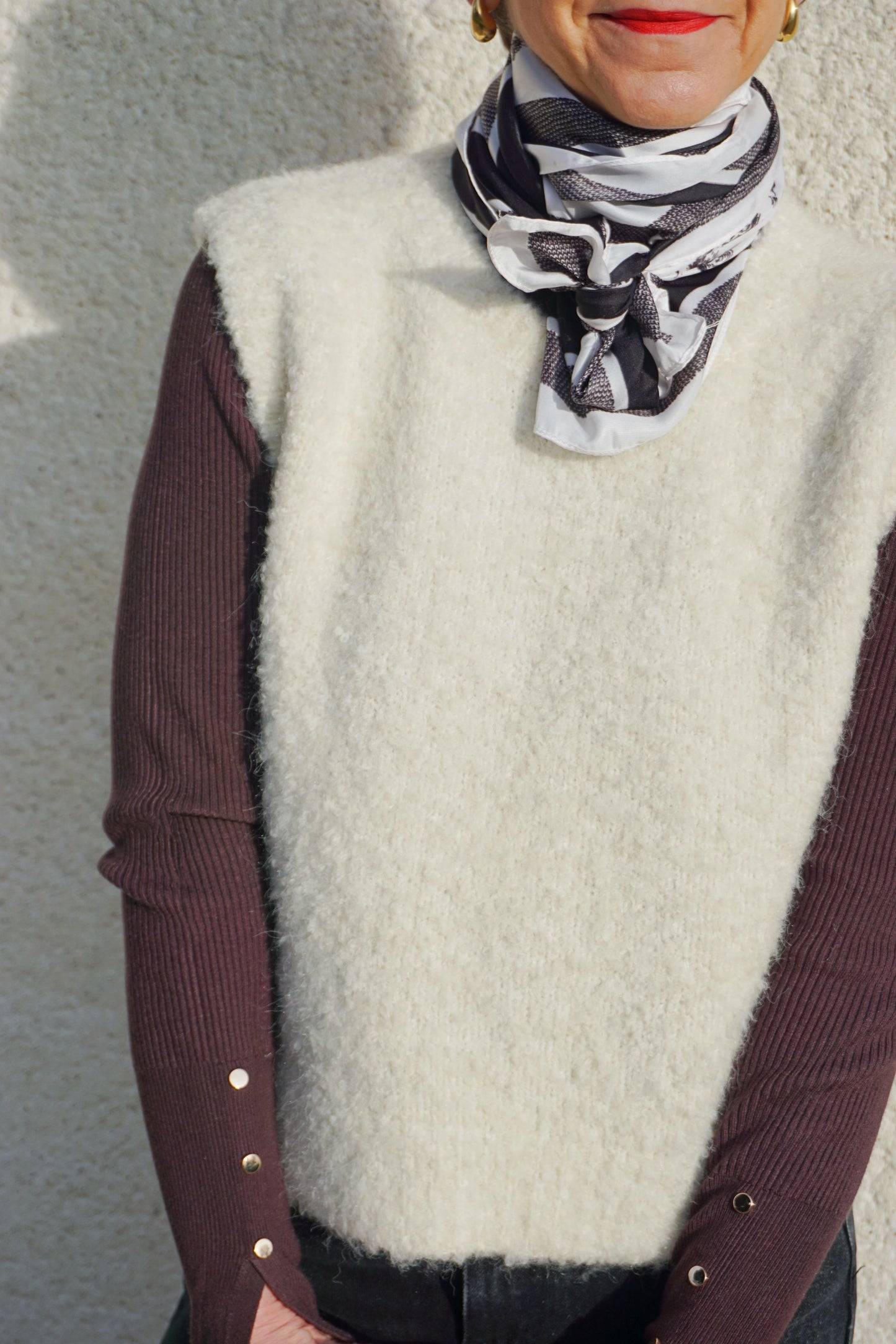 Pull sans manches crème bouclettes