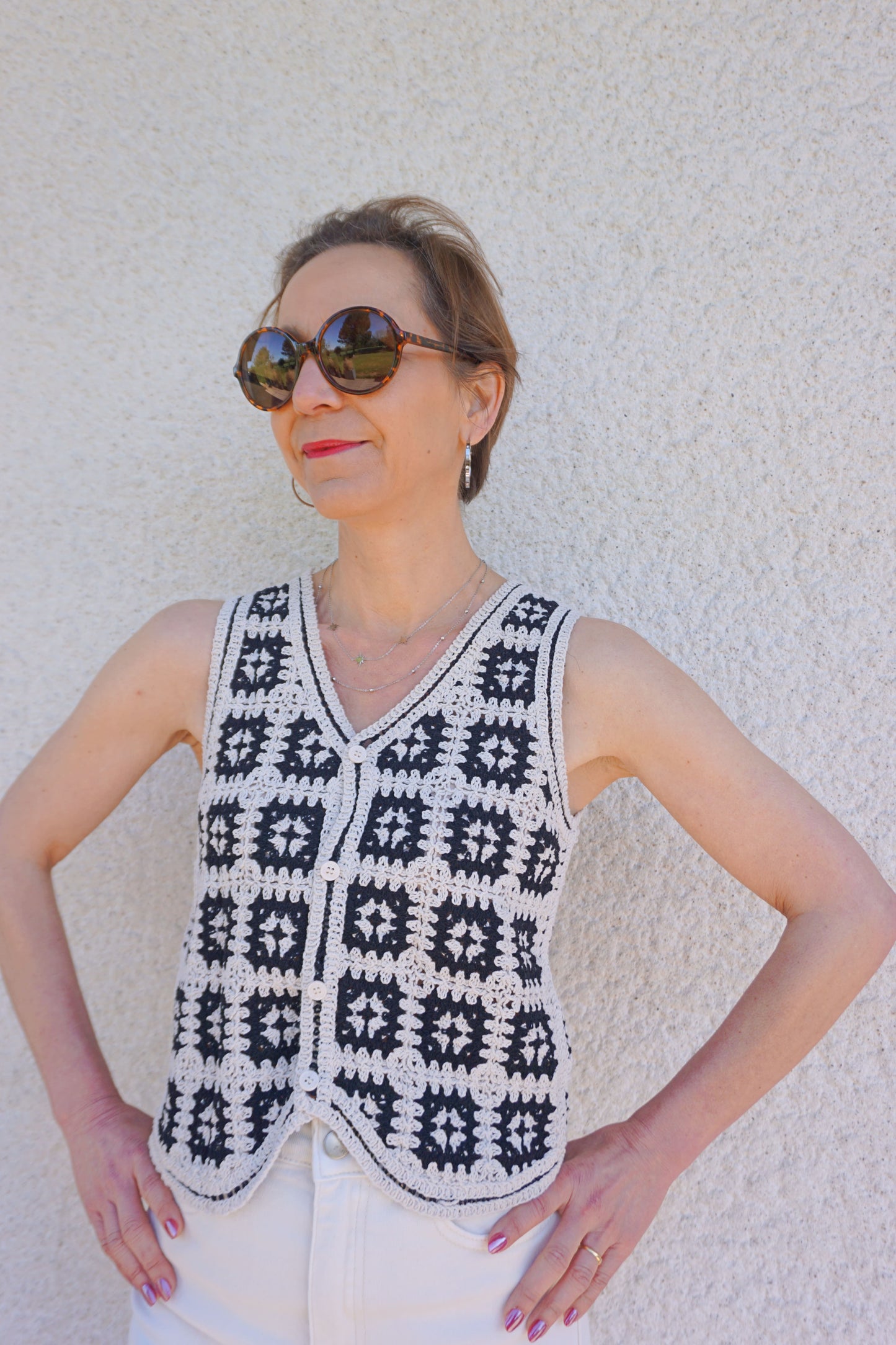 Top gilet crochet noir et crème