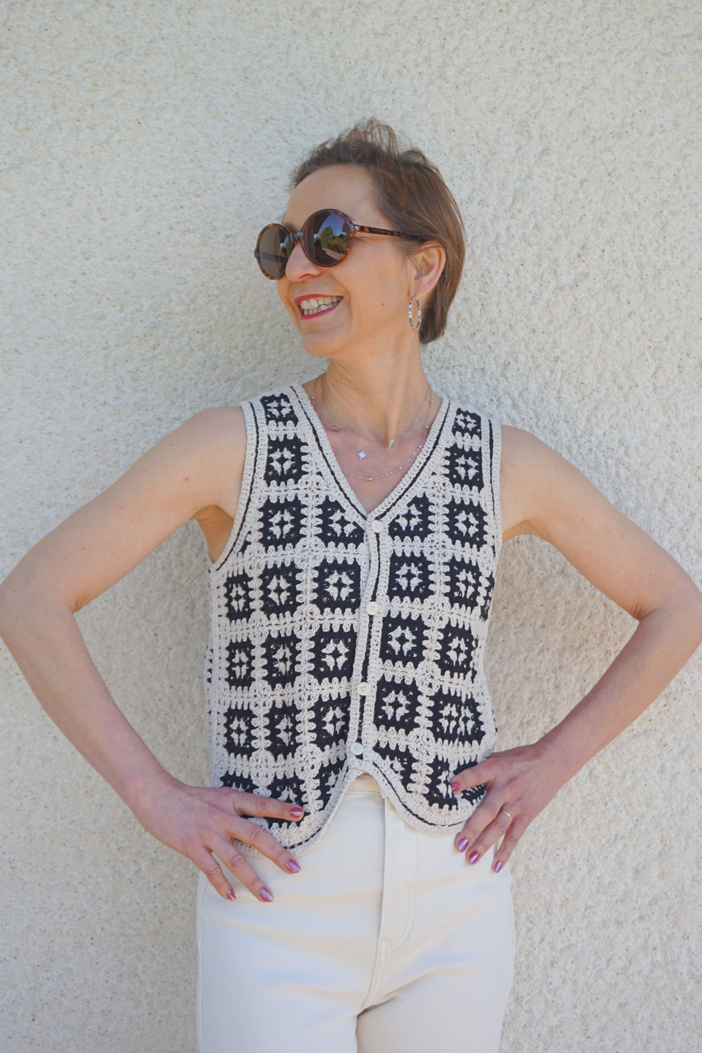 Top gilet crochet noir et crème