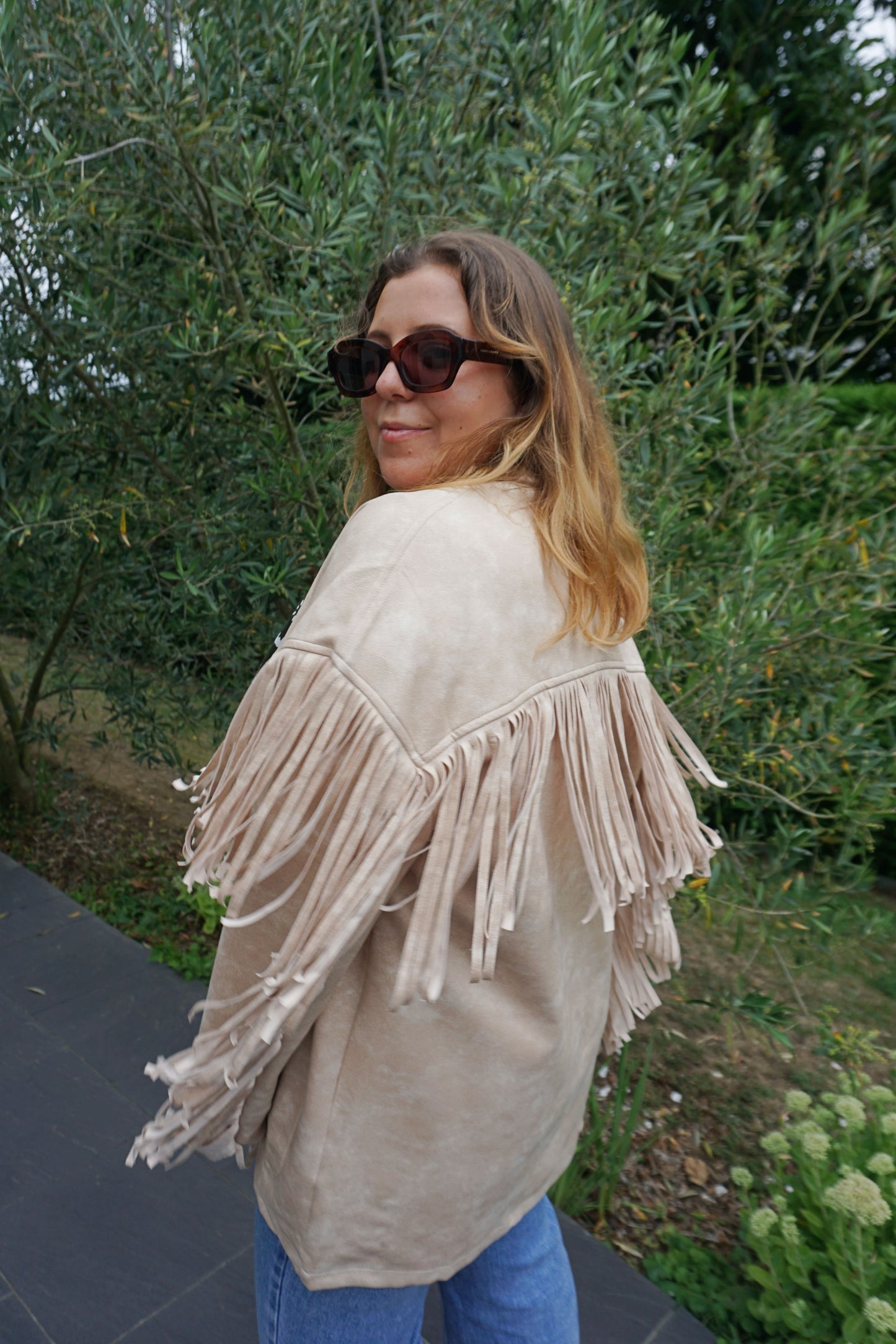 Veste effet daim crème à franges