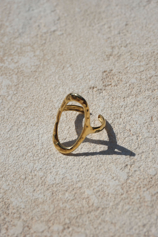 Golden oval opening ring