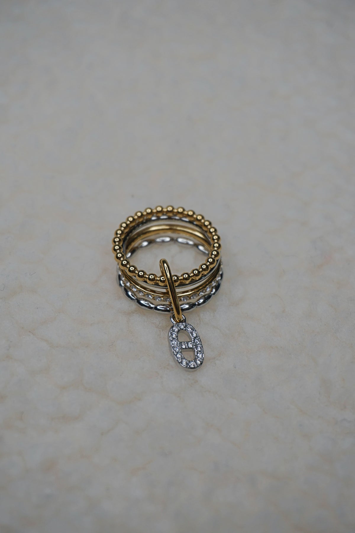 Bague dorée et argentée quadruple boucle marine
