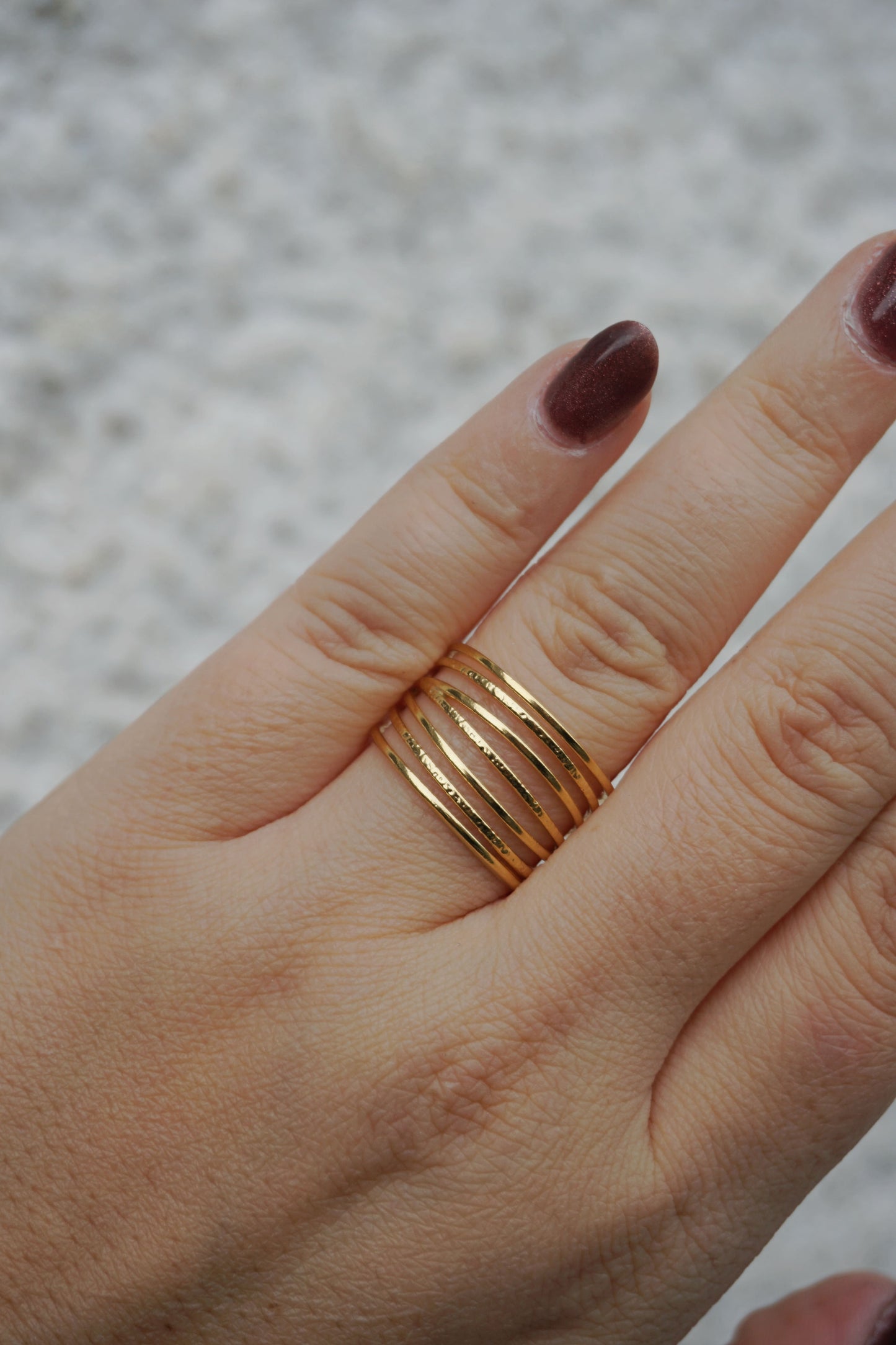 Bague dorée sept anneaux fins