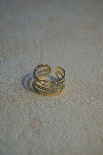 Bague dorée triple boucle et strass