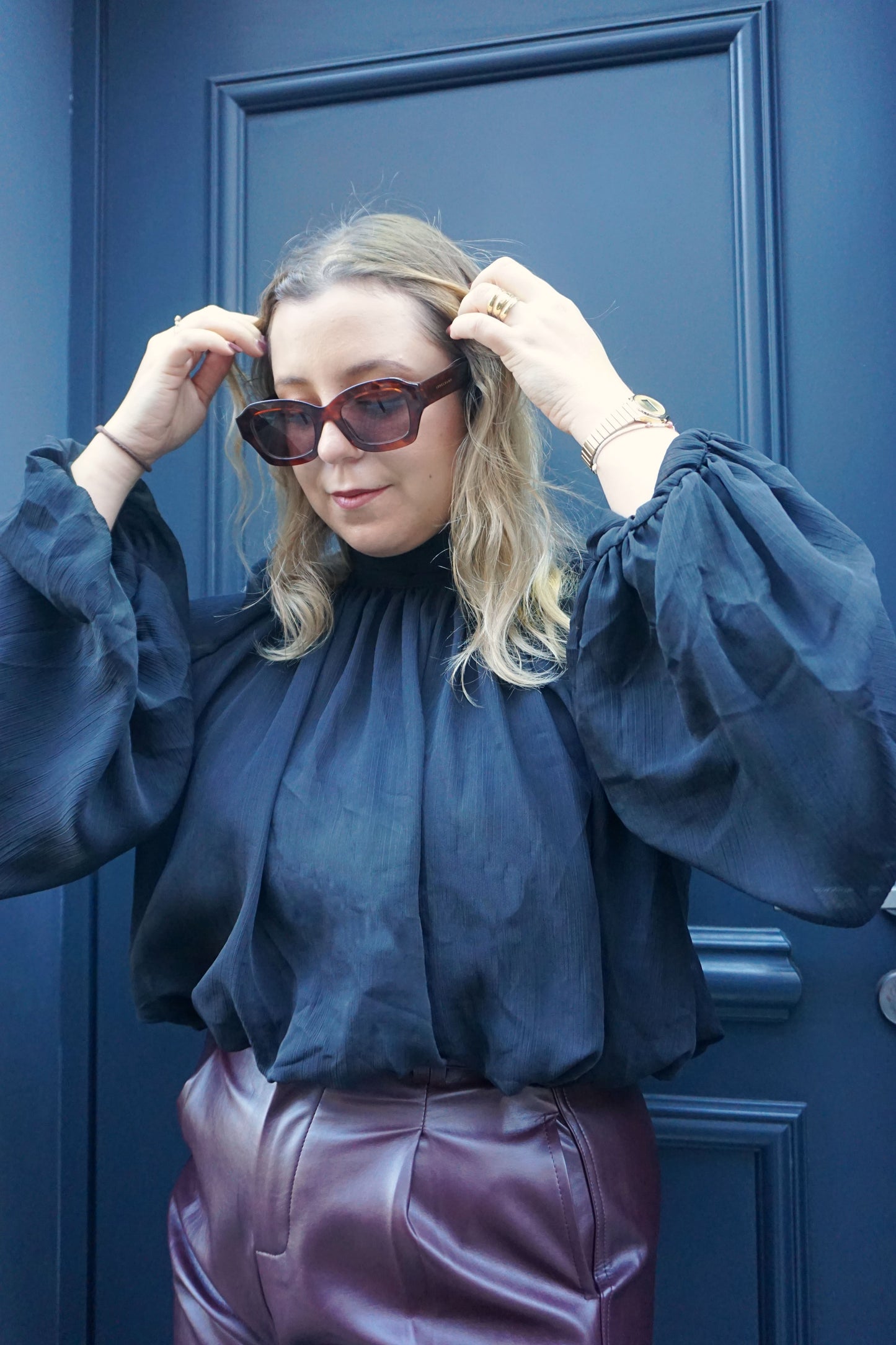 Blouse drapée noire col montant