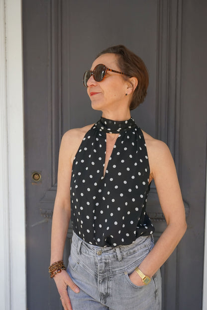 Blouse noire à pois col lavallière
