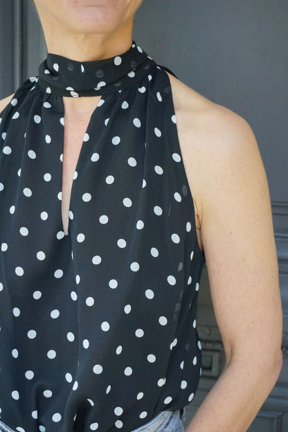 Blouse noire à pois col lavallière