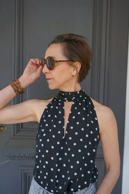 Blouse noire à pois col lavallière