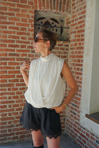 Blouse sans manches crème fluide ballon