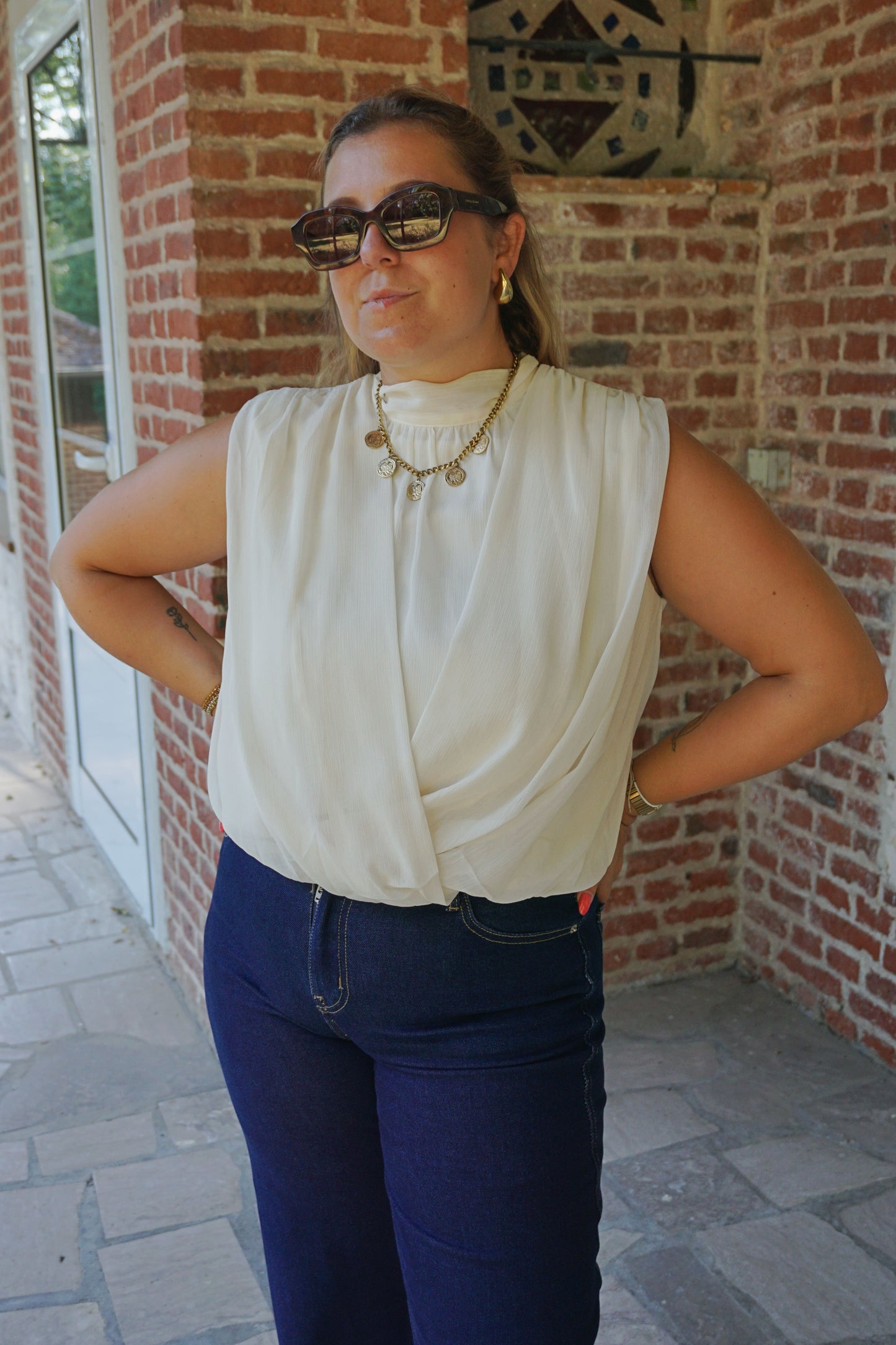 Blouse sans manches crème fluide ballon