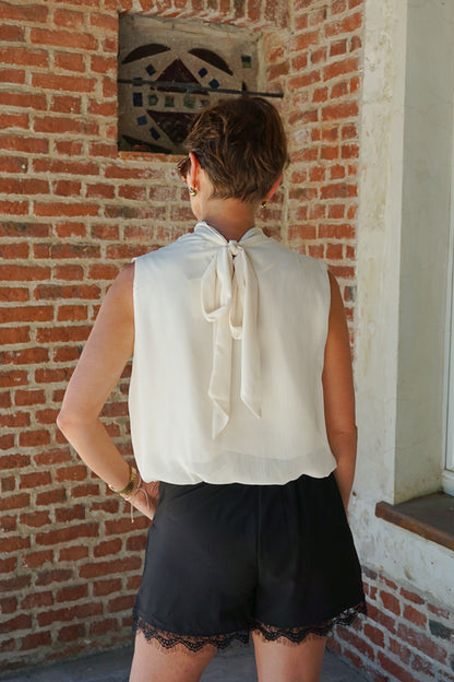 Blouse sans manches crème fluide ballon