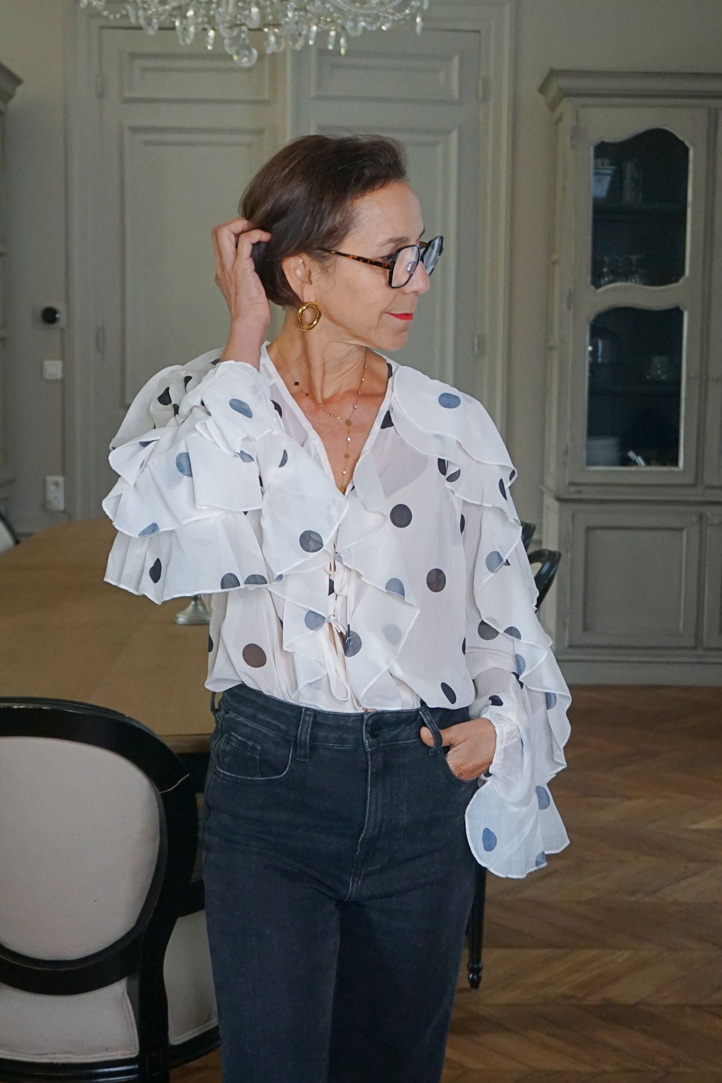 Blouse transparente blanche à pois
