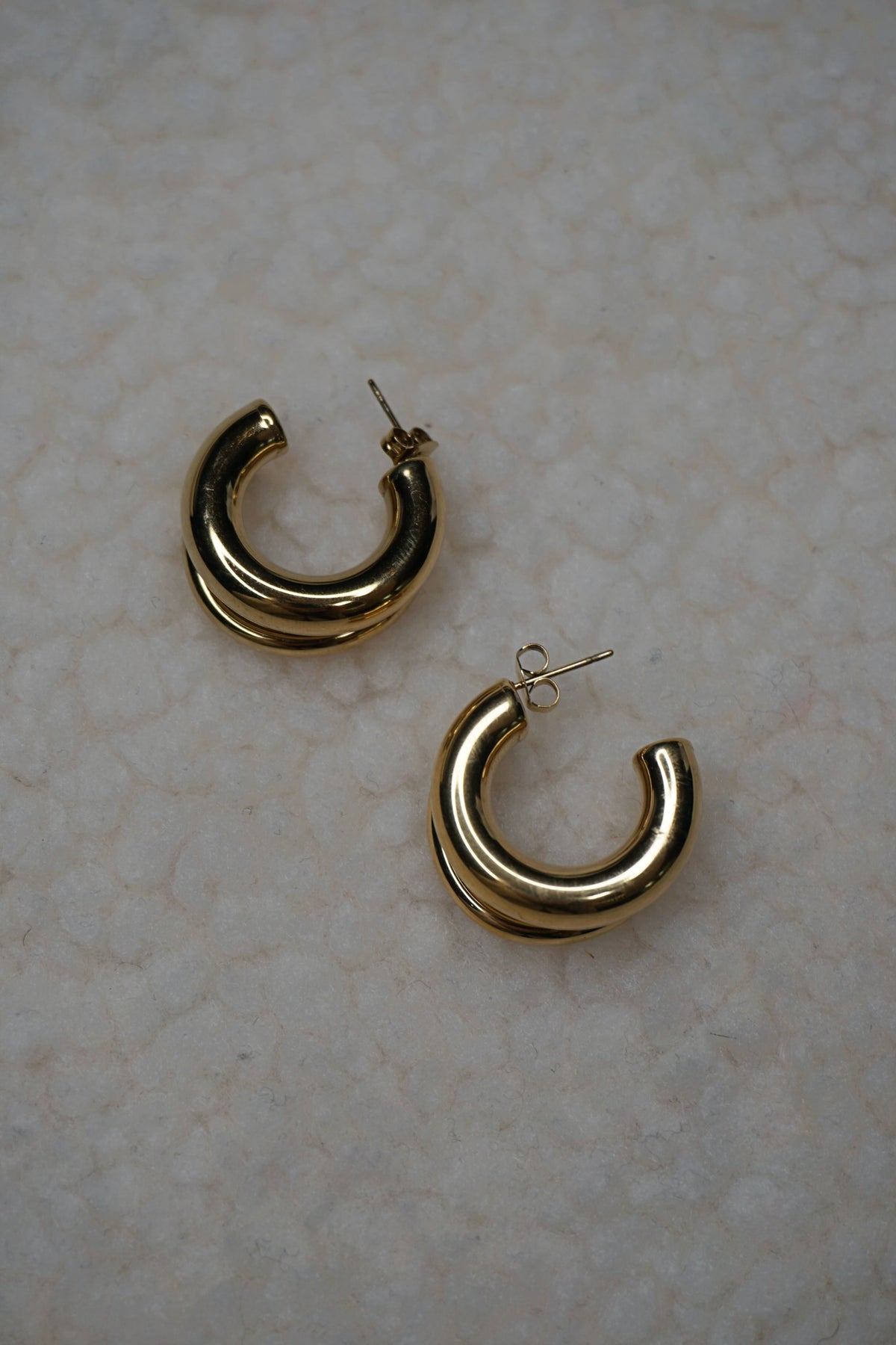Boucles d'oreilles dorées double créoles