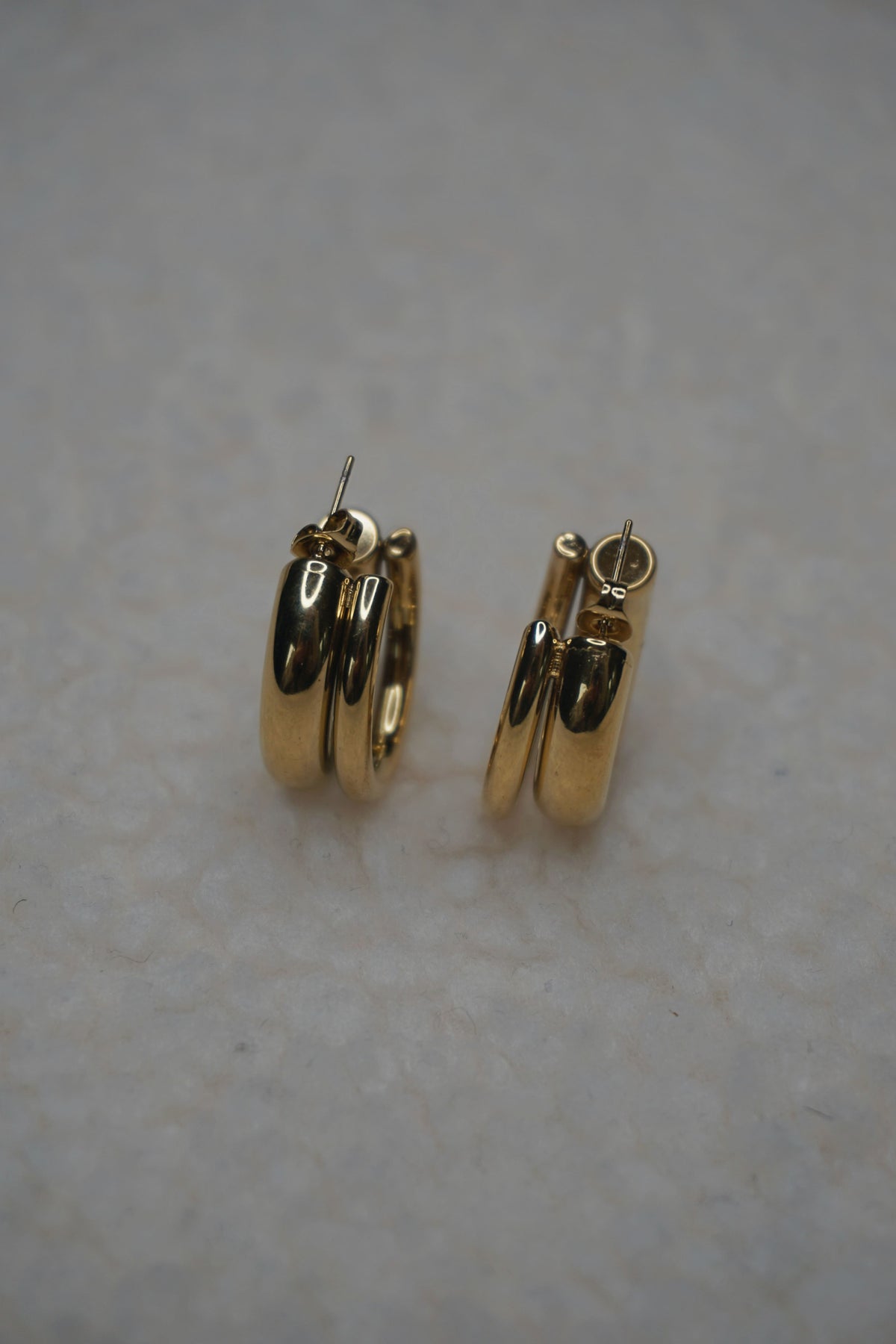 Boucles d'oreilles dorées double créoles