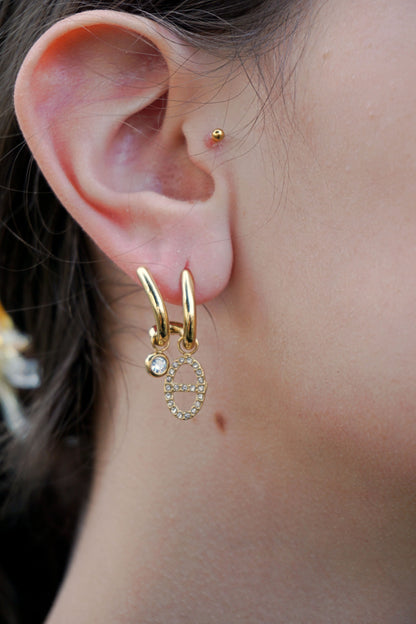 Boucles d'oreilles dorées doubles boucle strass