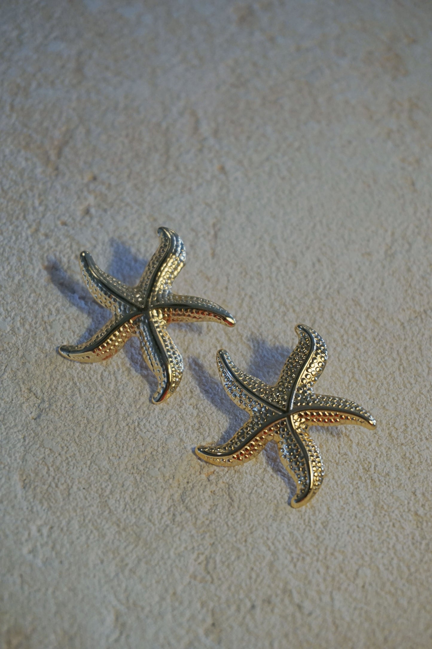 Boucles d'oreilles dorées étoiles de mer
