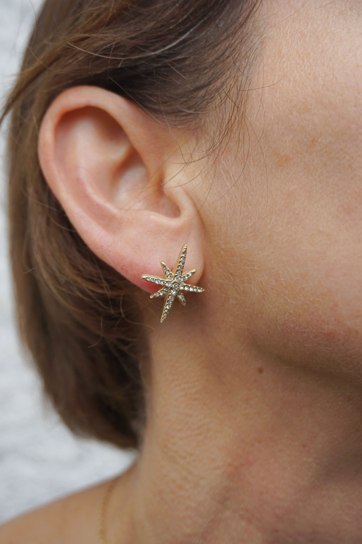 Boucles d'oreilles dorées étoile strass