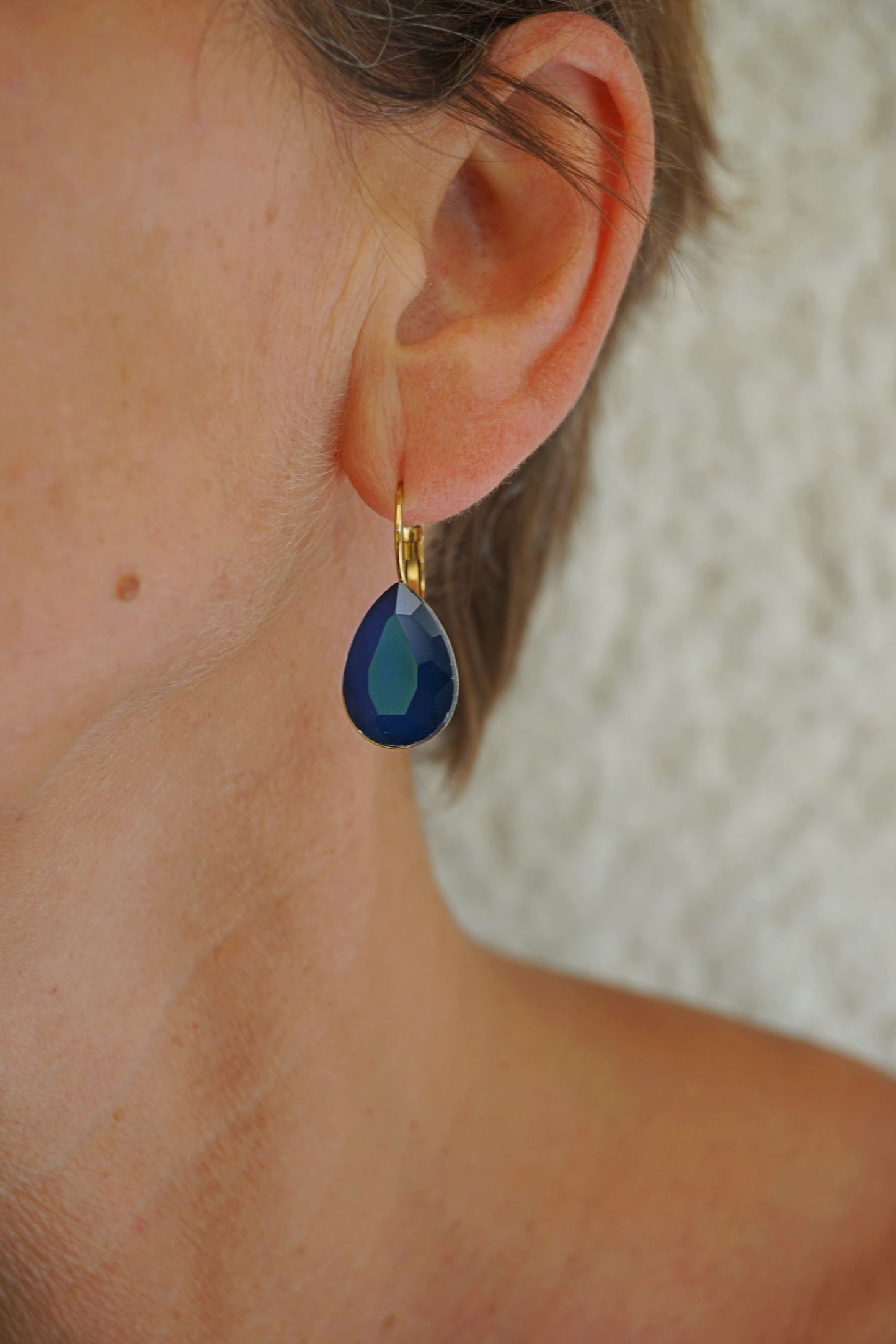 Boucles d'oreilles dorées pendantes bleues