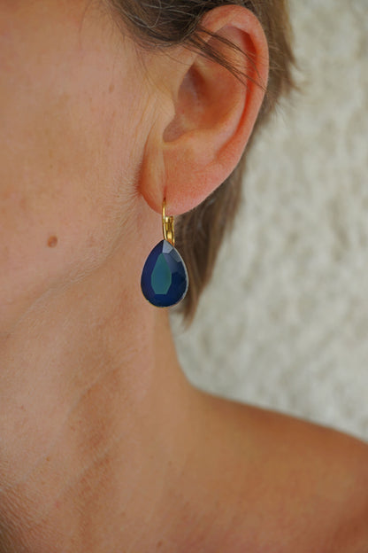 Boucles d'oreilles dorées pendantes bleues