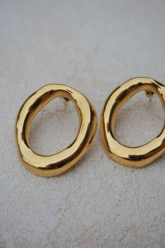 Boucles d’oreilles dorées rond organique