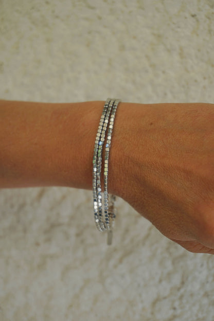 Bracelet argenté triple brillant