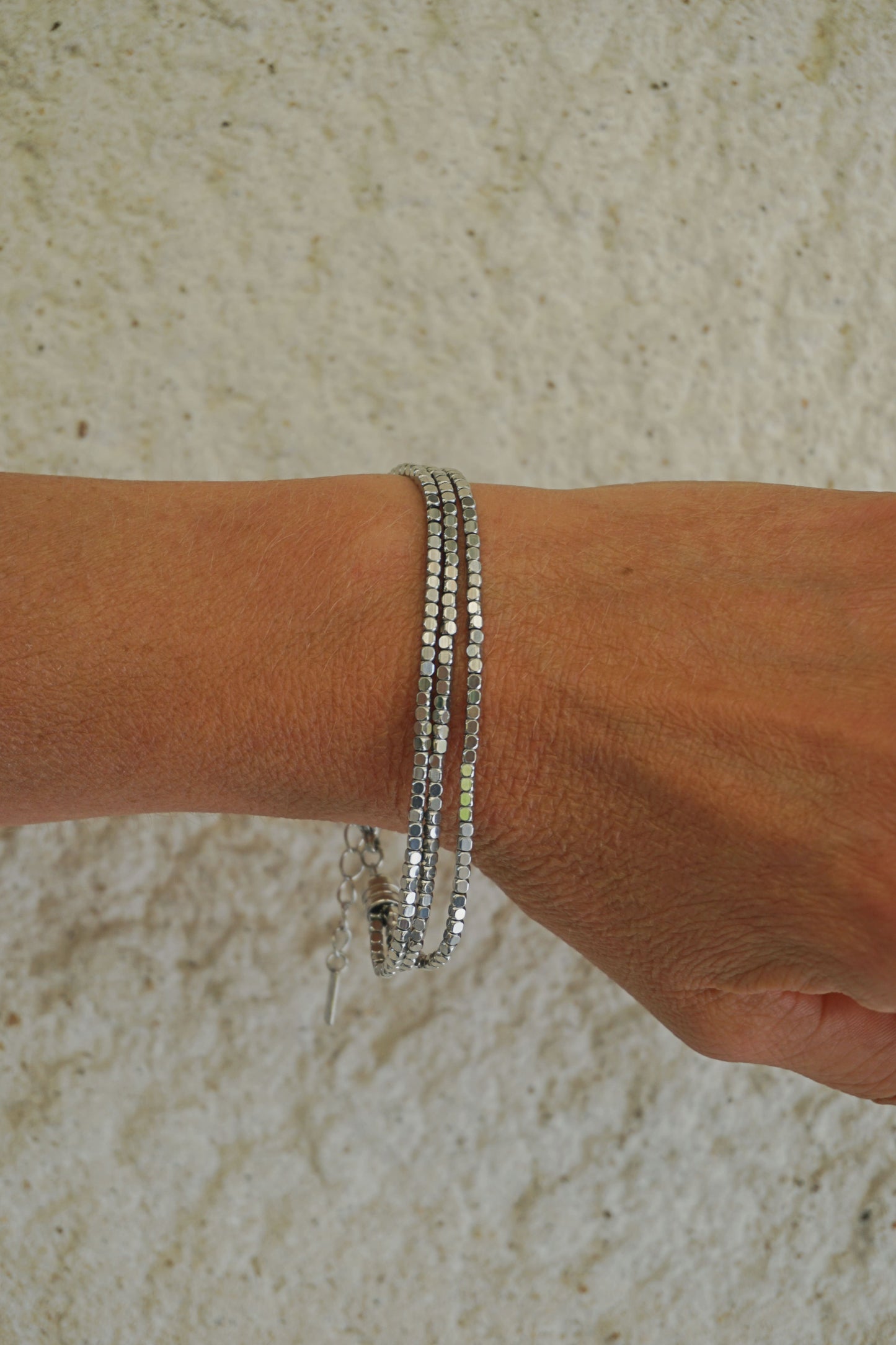 Bracelet argenté triple brillant