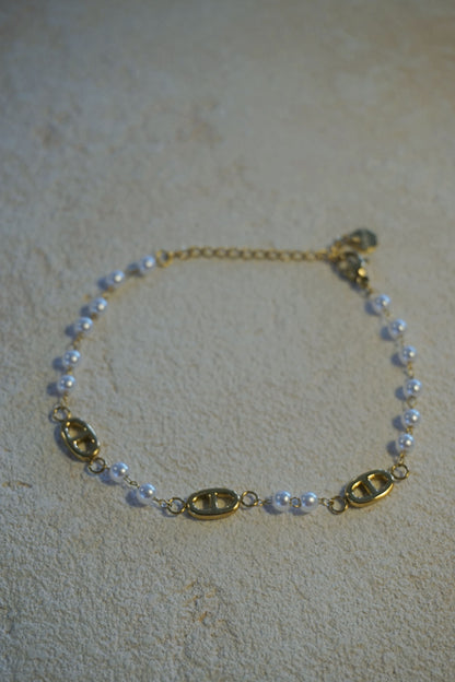 Bracelet doré boucles et perles