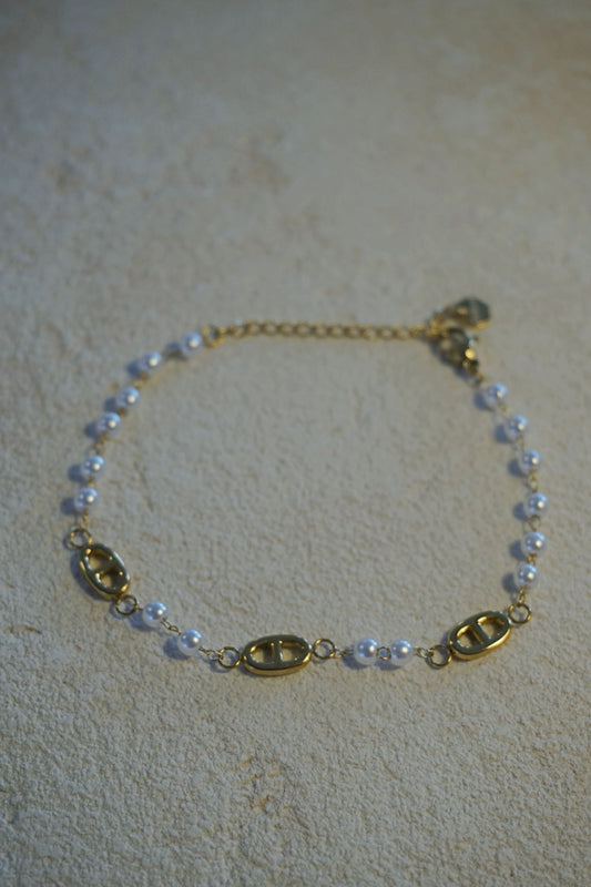 Bracelet doré boucles et perles