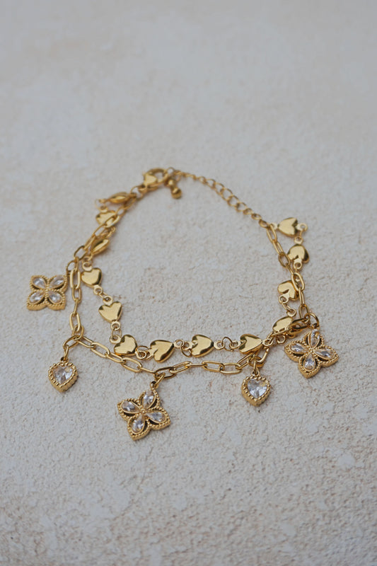 Bracelet doré charms fleurs et cœurs