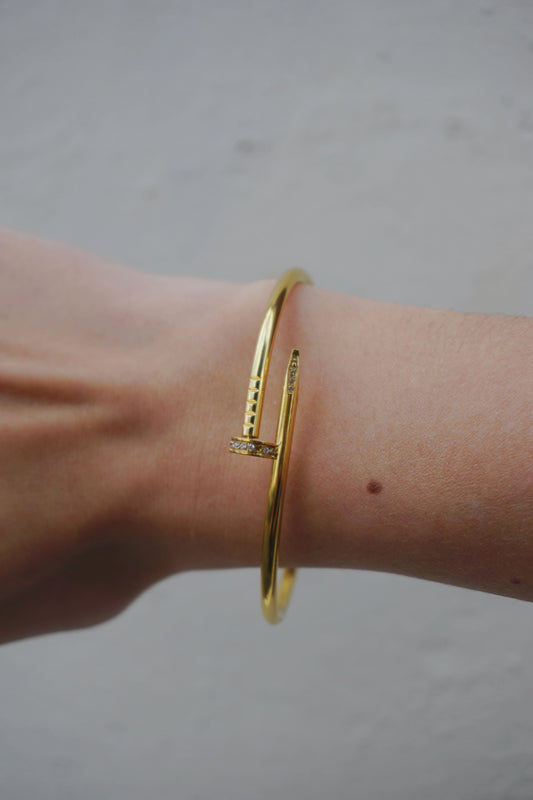 Bracelet doré clou et strass