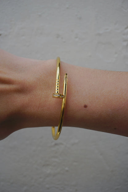 Bracelet doré clou et strass