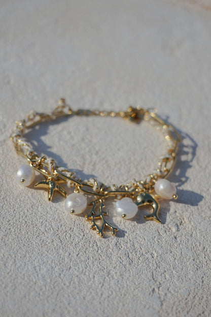 Bracelet doré corde charms corail