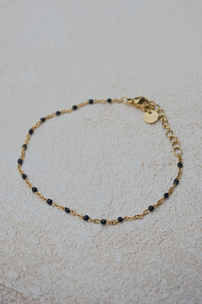Bracelet fin doré petites perles noires