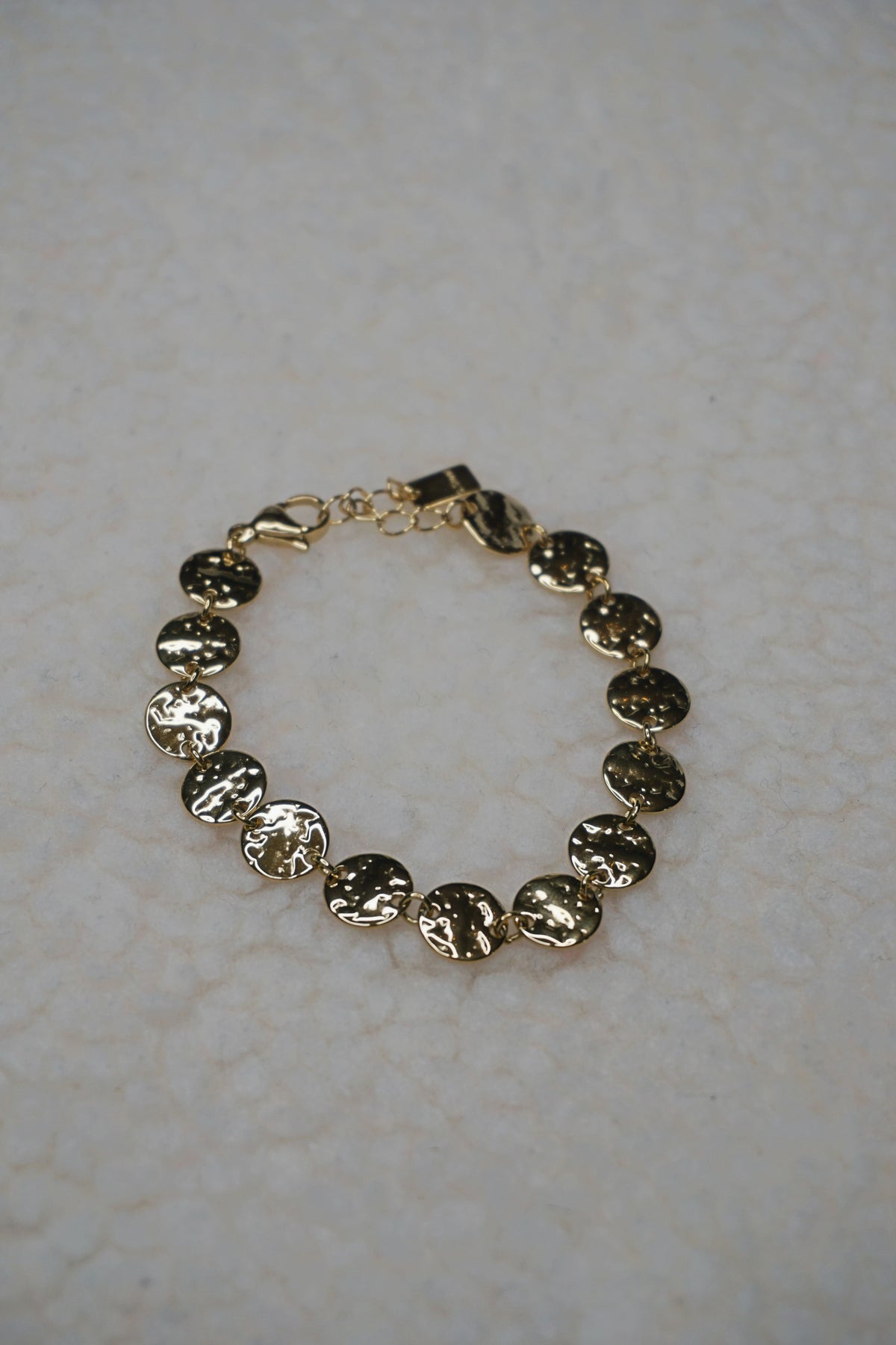 Bracelet doré médaillons brillants