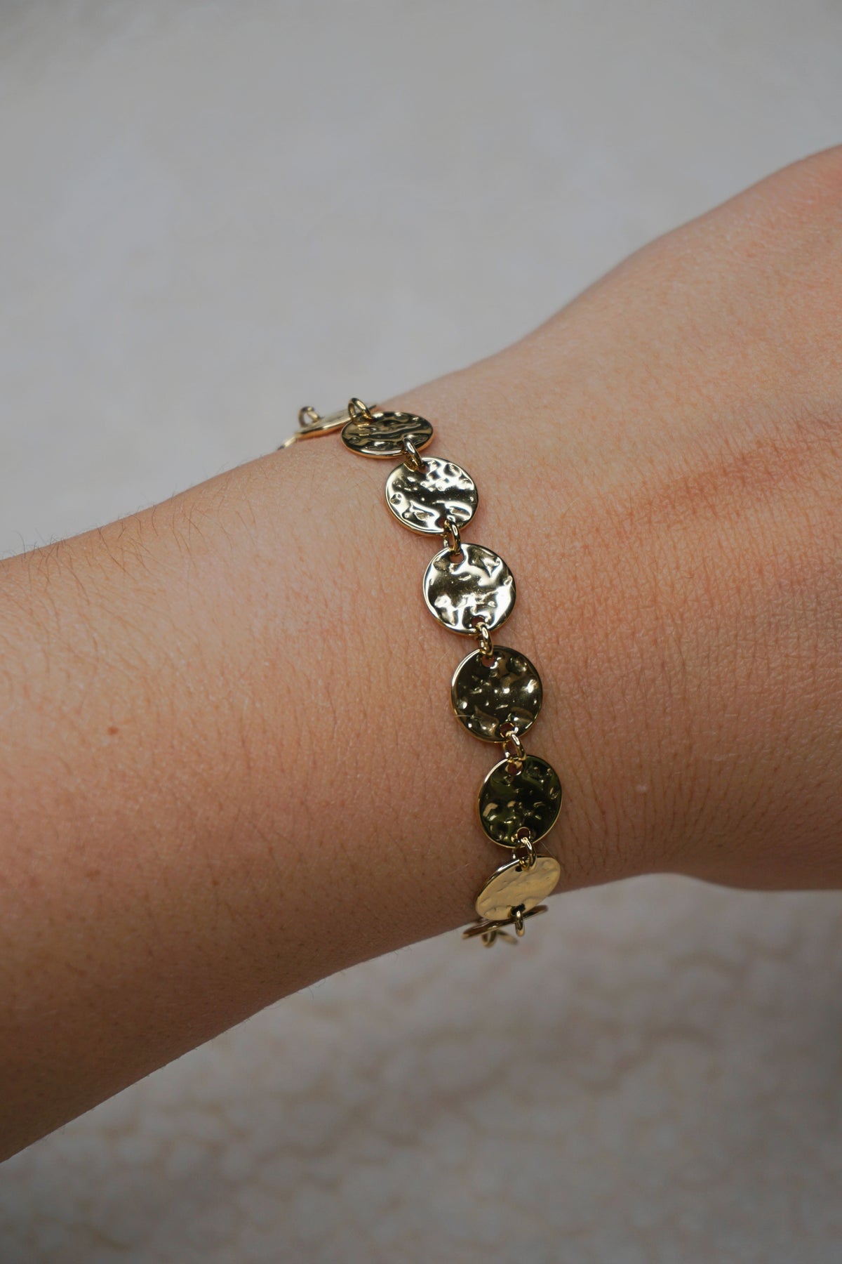 Bracelet doré médaillons brillants