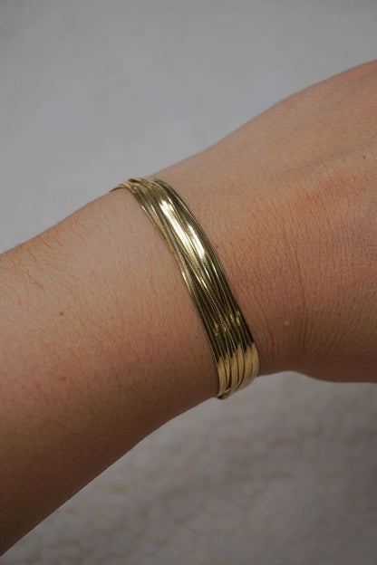 Bracelet doré multiple maille brillante