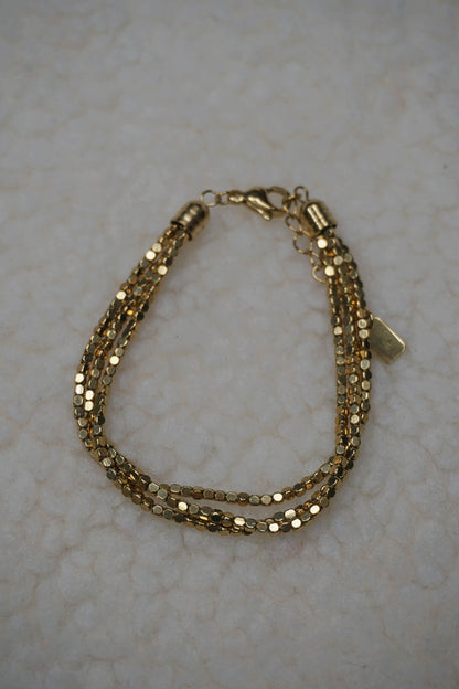 Bracelet doré triple brillant