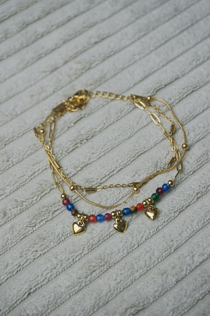 Bracelet doré triple coloré cœurs