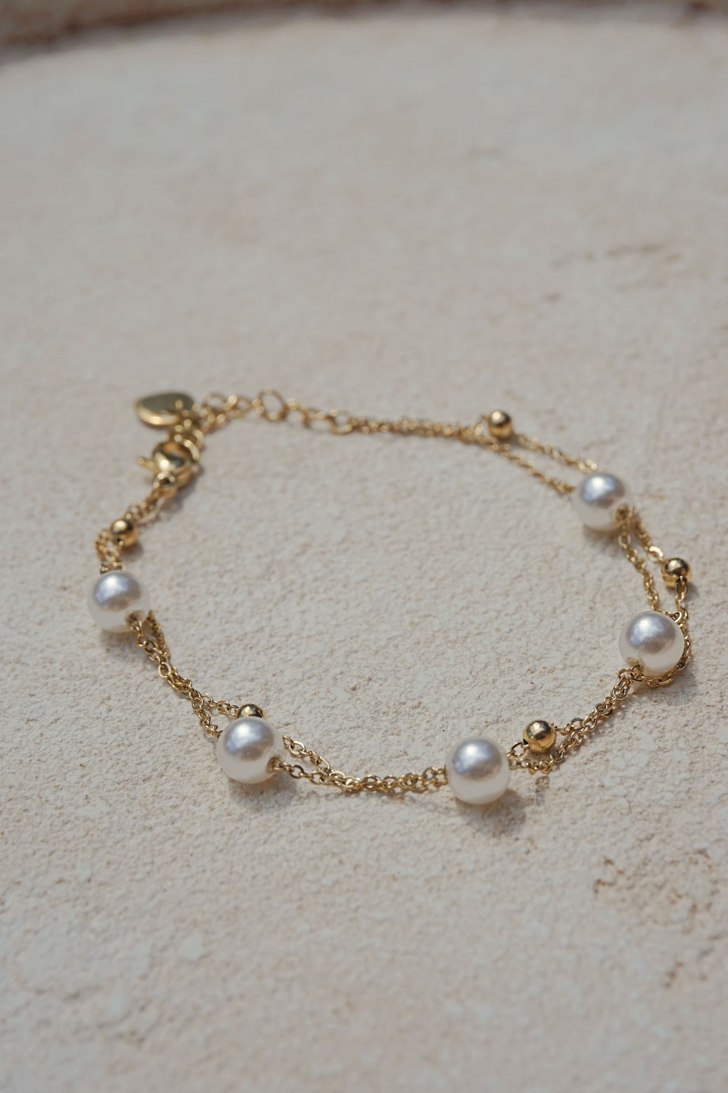 Golden double chain pearl bracelet