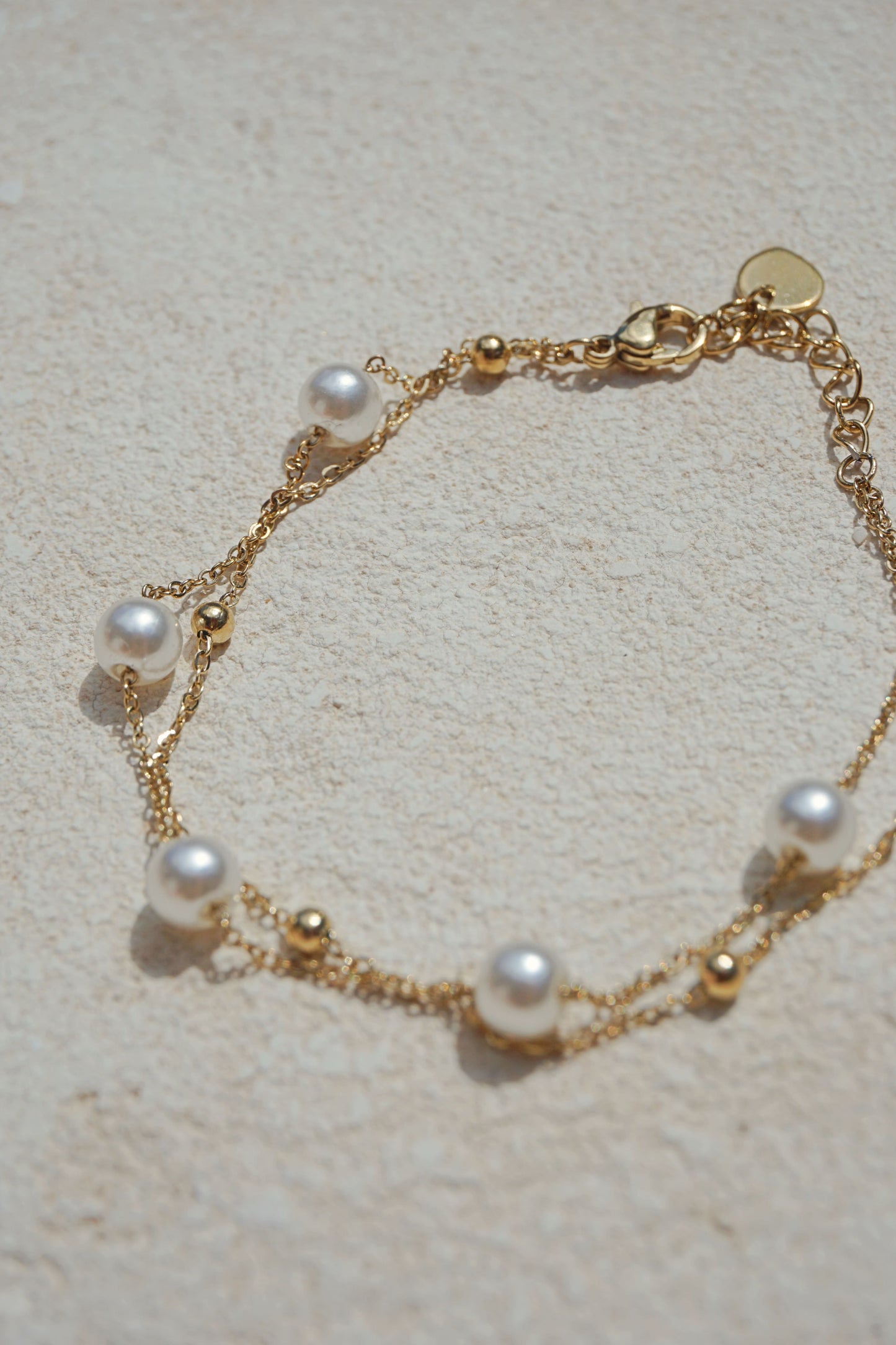 Golden double chain pearl bracelet