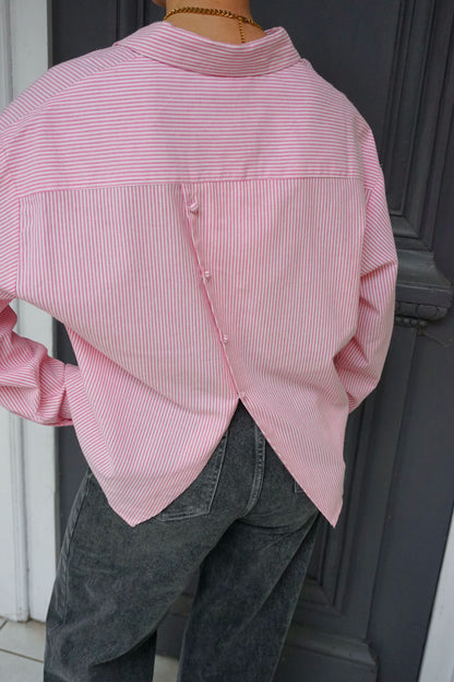 Chemise rose rayée ouverture dos