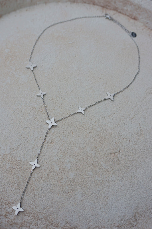 Collier argenté tombant étoiles