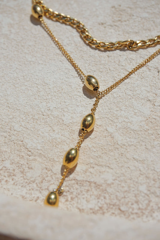 Gold double ball necklace