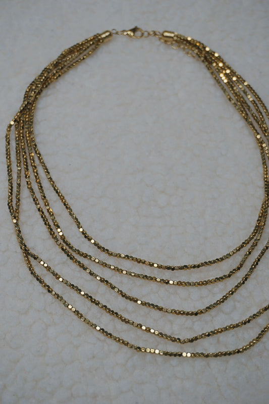 Collier doré brillant cinq rangs